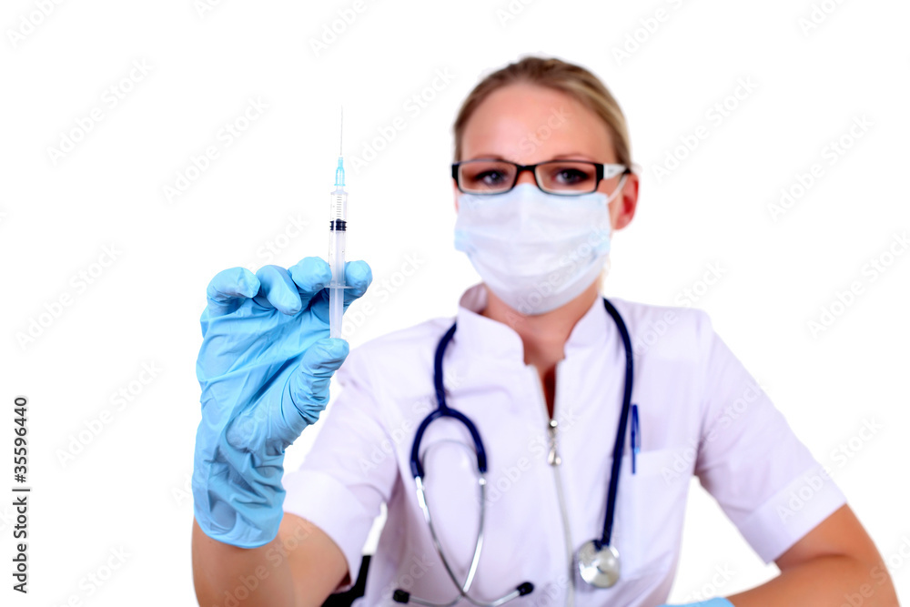 Young female doctor with syringe Young female doctor with syringe