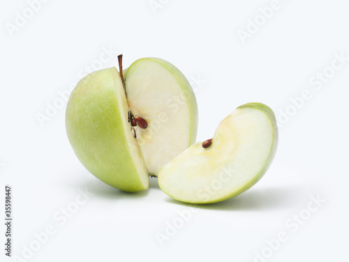 Green apple with slice