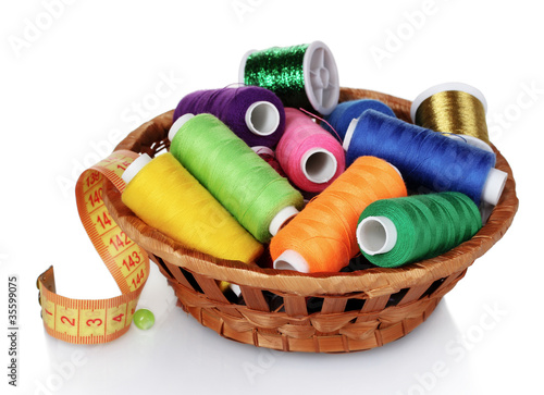 bright threads in basket and measuring tape isolated on white Fototapet