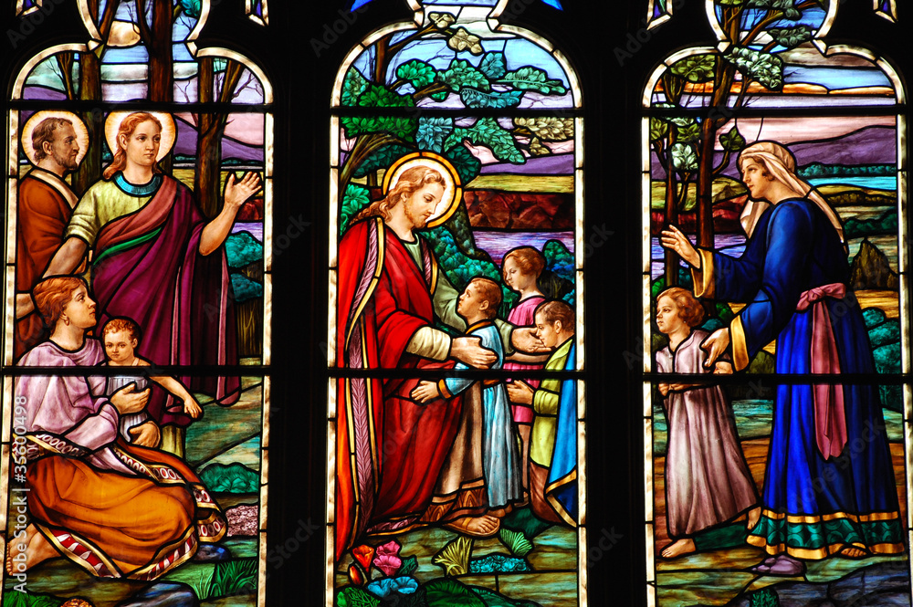 Fototapeta premium Colorful stained glass window showing Jesus