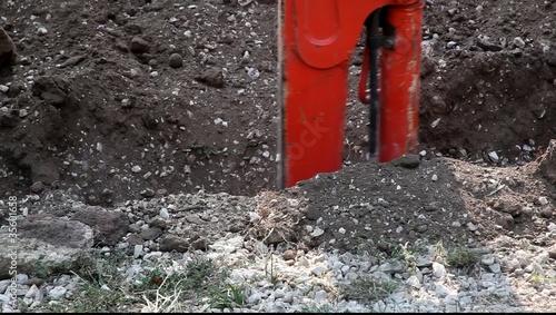 Backhoe digging at a construction site