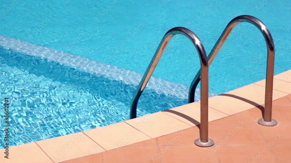 Handrails to stairs leading to swimming pool Handrails to stairs leading to swimming pool