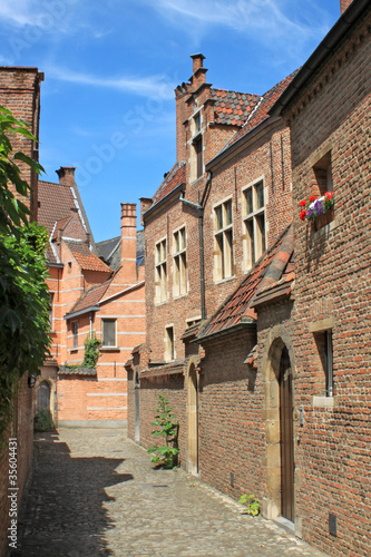 Fototapeta Naklejka Na Ścianę i Meble -  Old narrow street in medieval a city