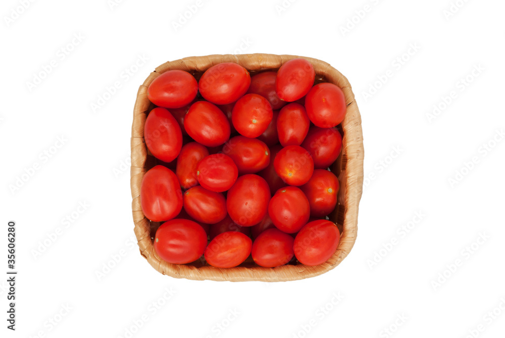Red tomatoes in a basket Red tomatoes in a basket