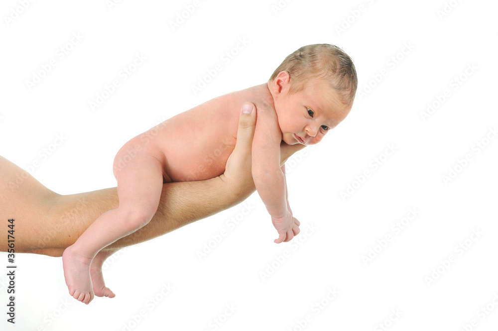 father hand holding beautiful one month baby father hand holding beautiful one month baby