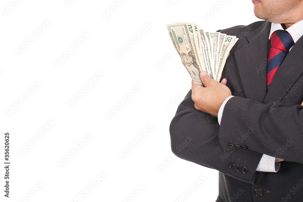 businessman holding a lot of dollar bills businessman holding a lot of dollar bills