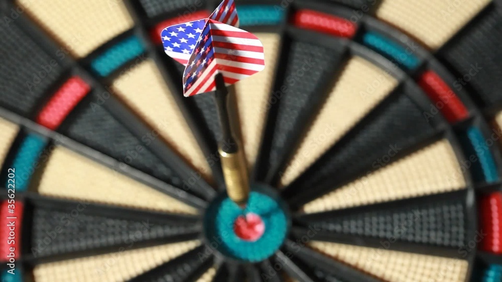 Dart with American flag hit target directly Dart with American flag hit target directly
