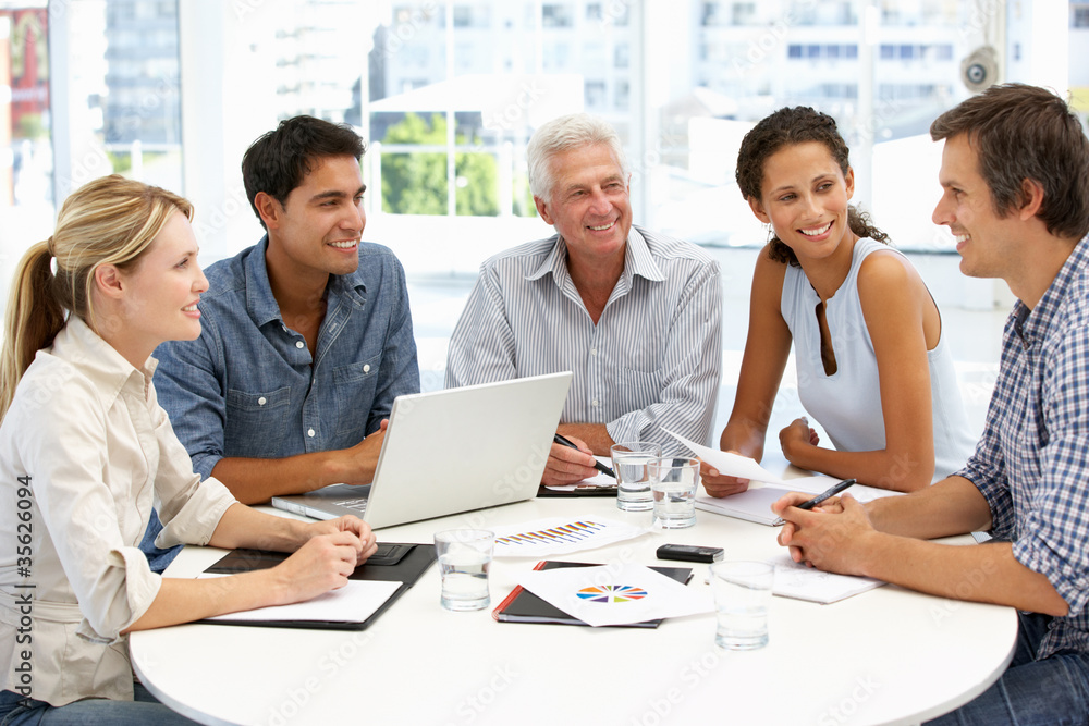 Mixed group in business meeting Mixed group in business meeting