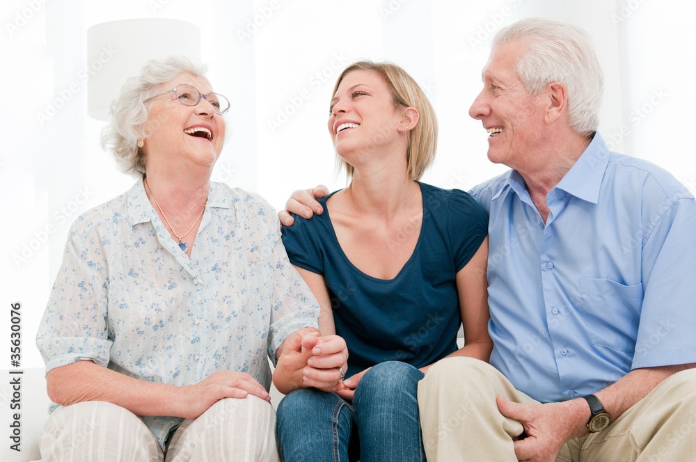 Smiling granddaughter with grandparents Smiling granddaughter with grandparents
