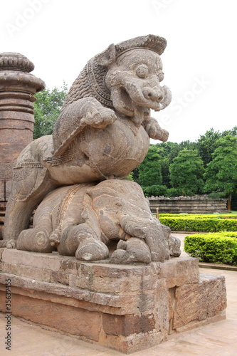 Giant lion crushing war elephant at the entrance of sun temple