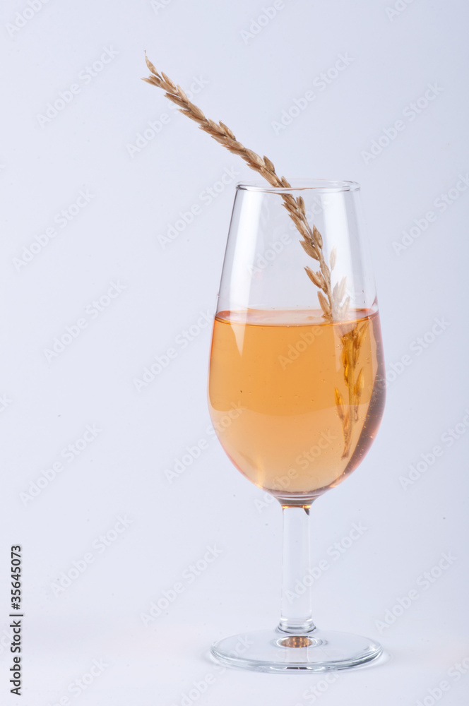 A glass filled with orange substance and spice #1 A glass filled with orange substance and spice #1