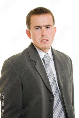 Dissatisfied businessman on a white background.