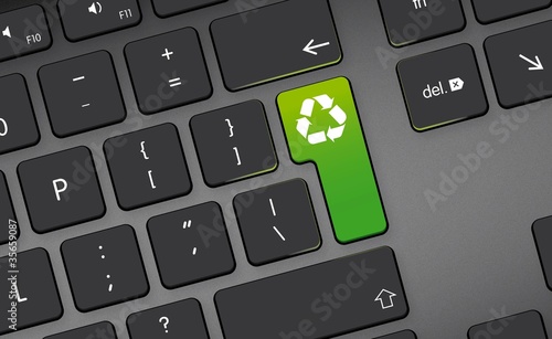 recycling icon, button on black keyboard