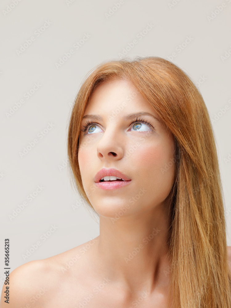 Fototapeta premium beautiful woman naked shoulders looking up