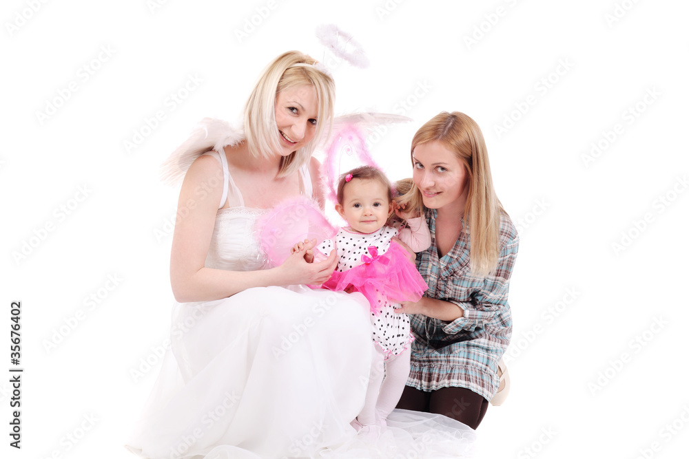 two girls with a baby