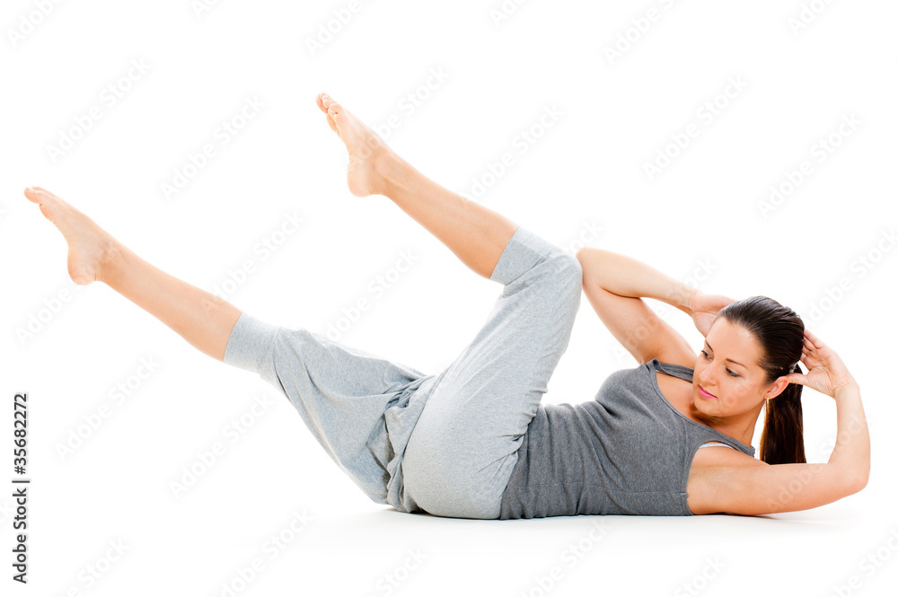 woman doing exercises for abdominal muscles woman doing exercises for abdominal muscles