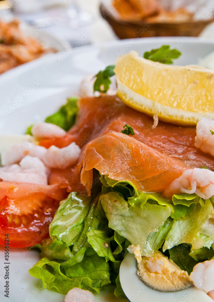 Fresh seafood salad with smoked salmon