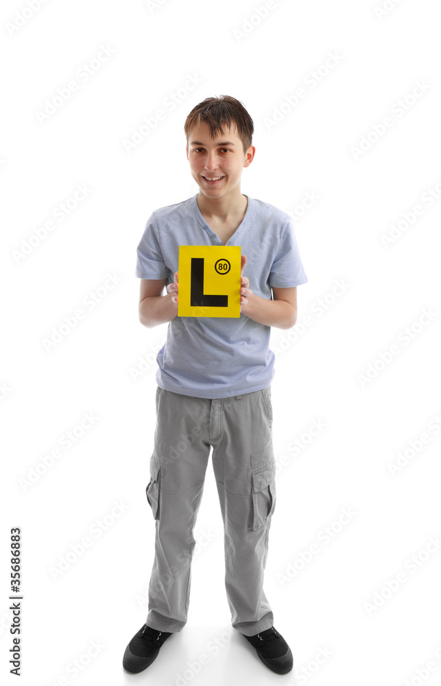 Fototapeta premium Teen boy holding L learner plates
