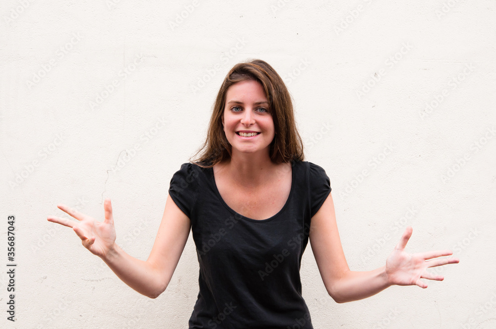 Portrait of a surprised young woman in the streets Portrait of a surprised young woman in the streets