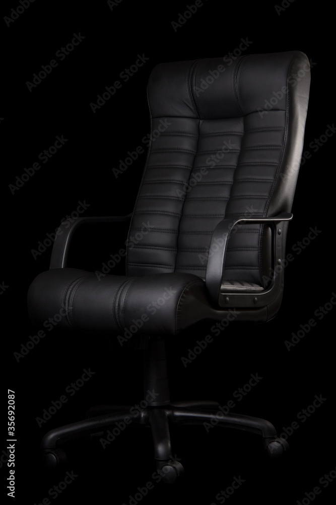 black executive leather chair, on a Black background Stock Photo | Adobe  Stock