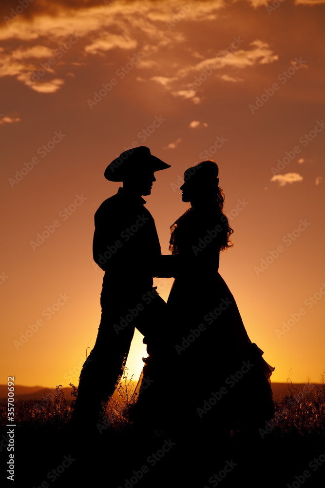 Cowboy couple silhouette in love