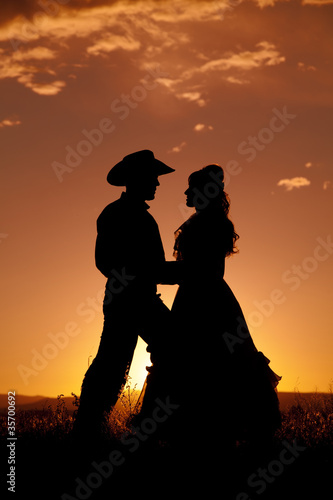 Cowboy couple silhouette in love