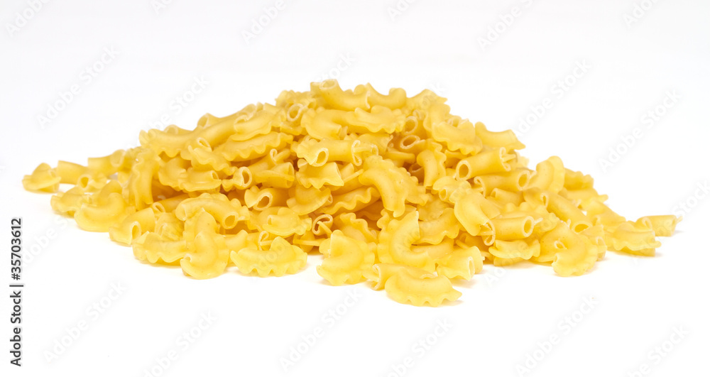 close up of a dried italian pasta on white background close up of a dried italian pasta on white background