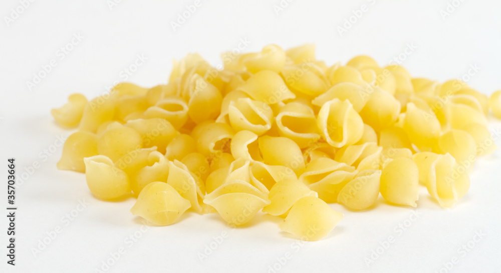 dried italian pasta on white background dried italian pasta on white background