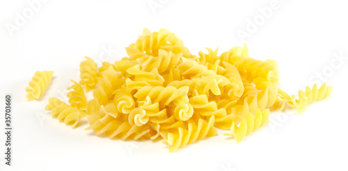 dried italian pasta on white background