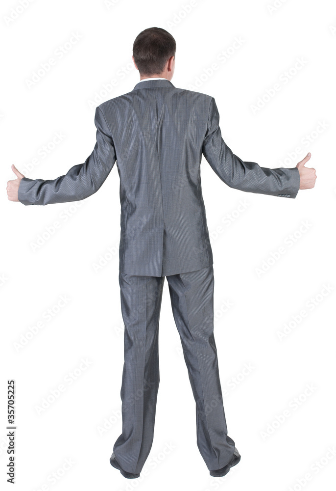 Businessman thumbs up. rear view. Businessman thumbs up. rear view.