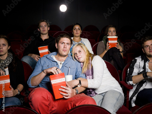 Scared couple at cinema