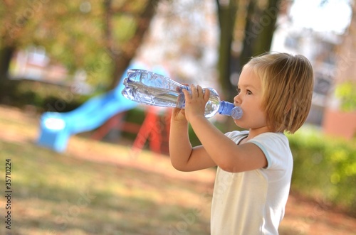 baby drinking water photo