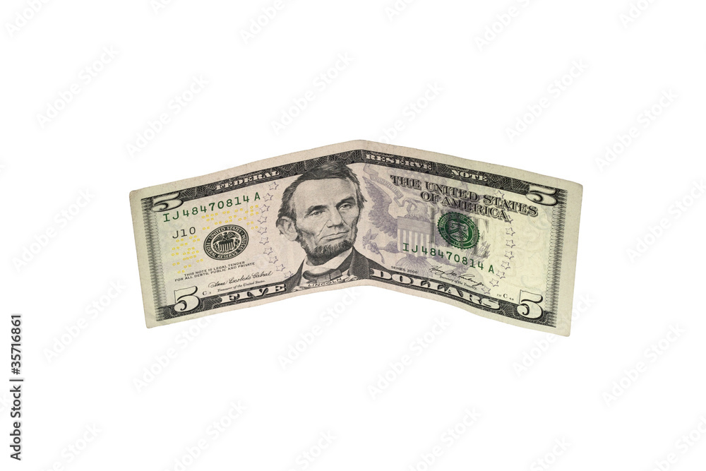 American five dollar banknote isolated over white American five dollar banknote isolated over white