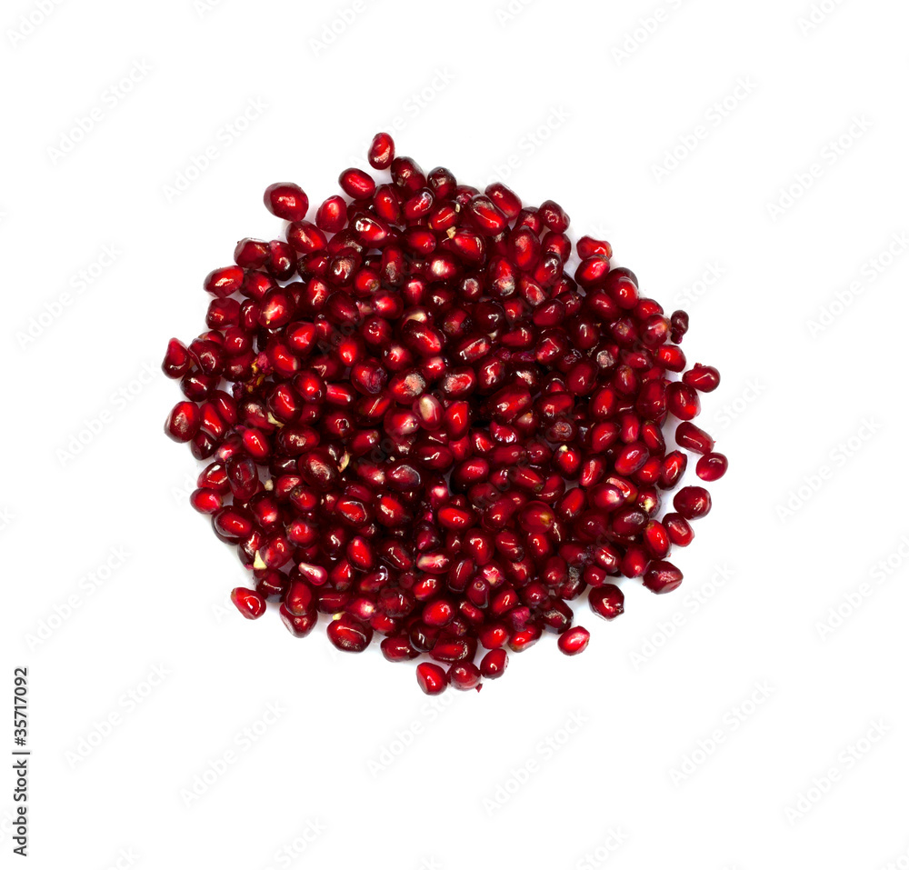 Extreme close up background of a red juicy ripe pomegranate frui Extreme close up background of a red juicy ripe pomegranate frui