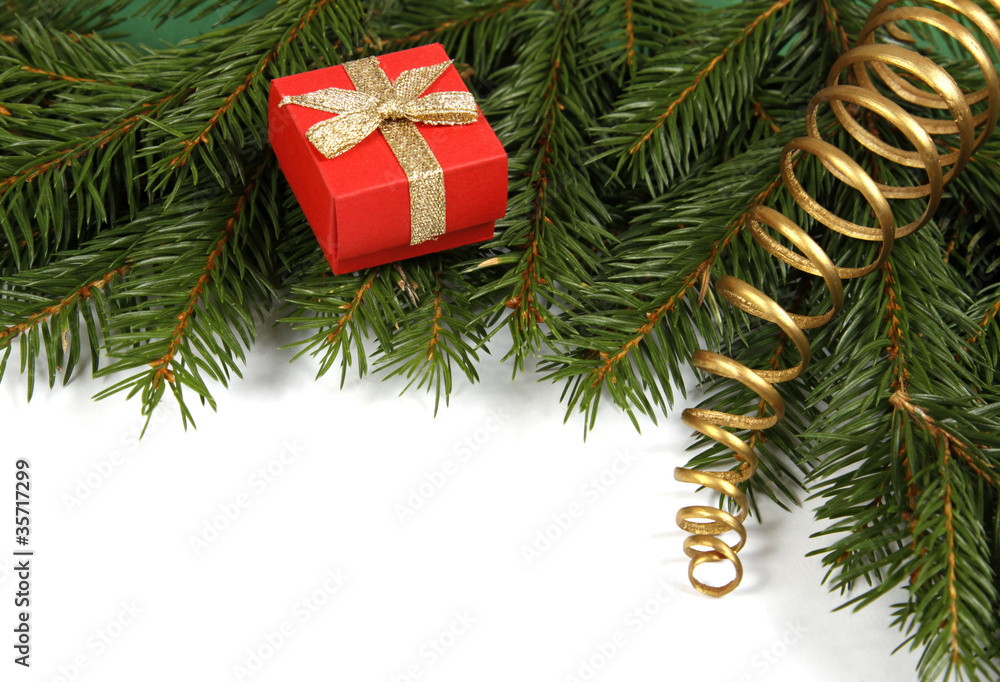 Red box decorated with the gold ribbon Red box decorated with the gold ribbon