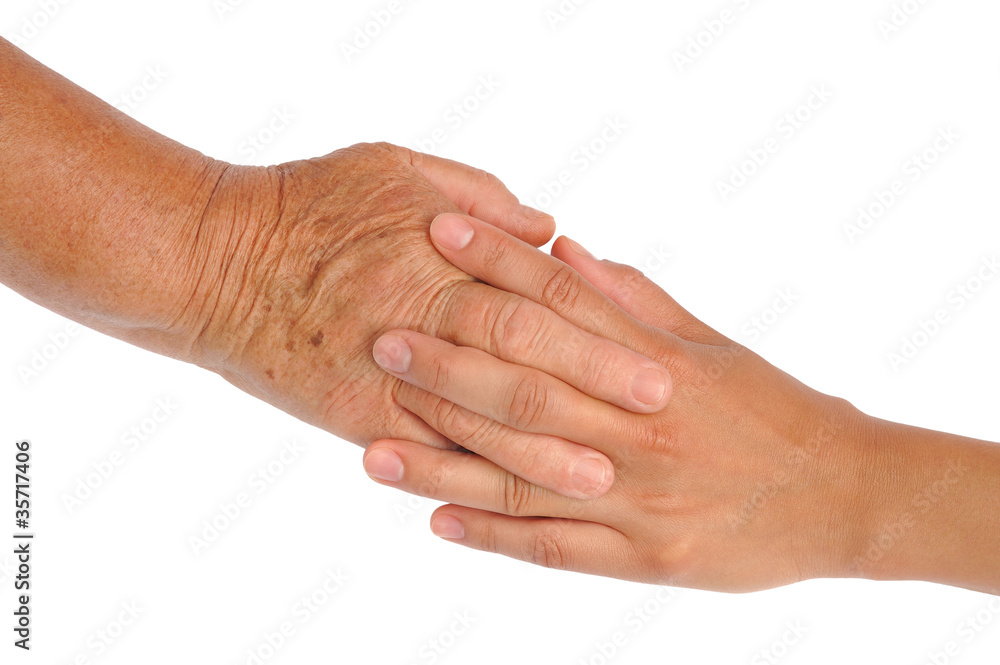 Hands of young and senior women - clipping path included Hands of young and senior women - clipping path included