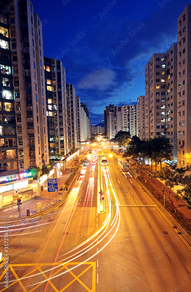 Modern Urban City with Freeway Traffic at Night, hong kong Modern Urban City with Freeway Traffic at Night, hong kong