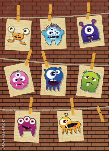 Collection of monsters on brick wall
