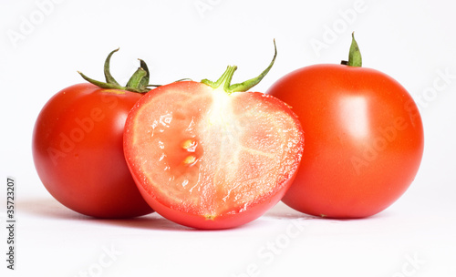 fresh tomatoes on the white background