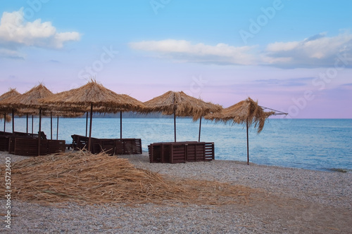 Beach Chairs and Umbrellas on a Black Sea.