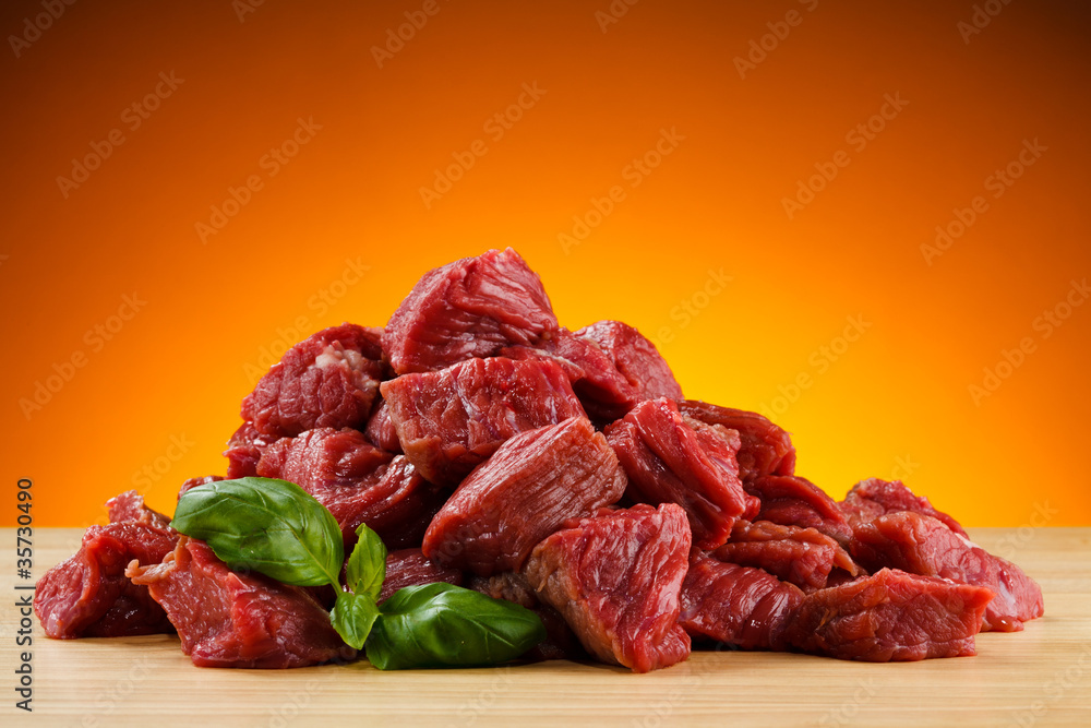 Raw beef on cutting board Raw beef on cutting board