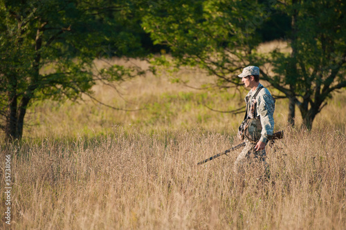 Hunter in countryside