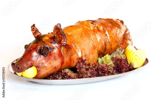 Grilled suckling pig on a plate