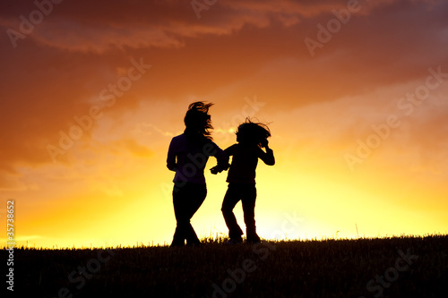 Dancing a jig at sunset. © Gregory Johnston