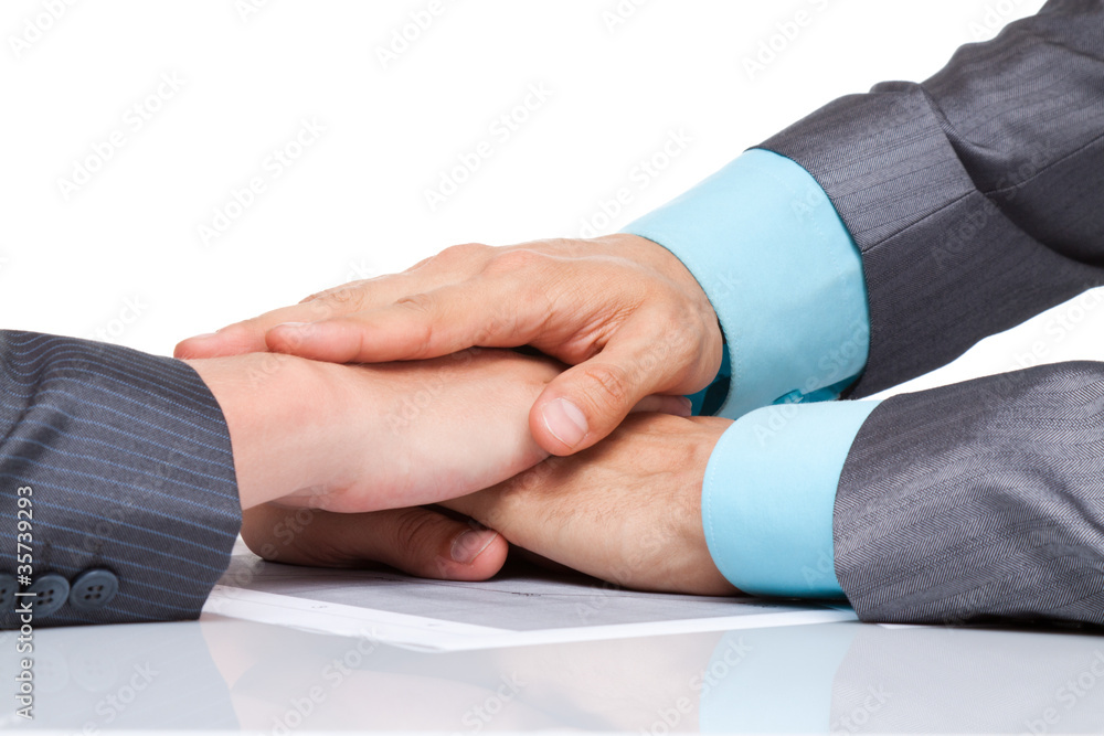 Business men hands at the desk over white background