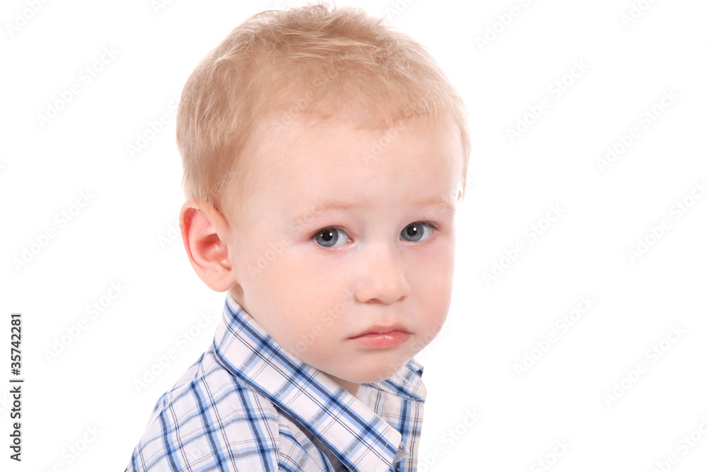 portrait of sad child over white background, close up