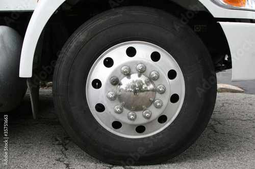 Wheel and tire set under a truck