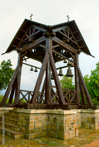 Ancient church bells on belfry wooden tower