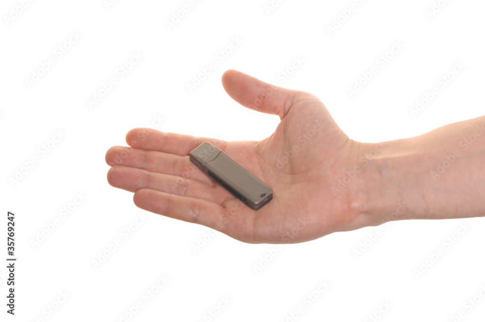 well shaped hand with an USB flash isolated over white well shaped hand with an USB flash isolated over white