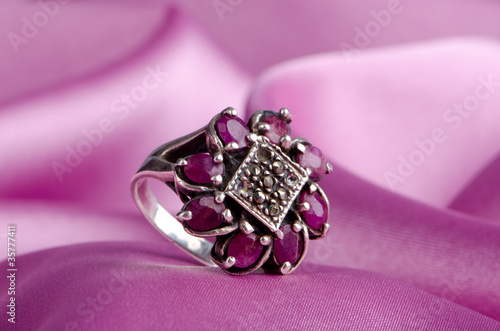 Fashion concept with ring on background